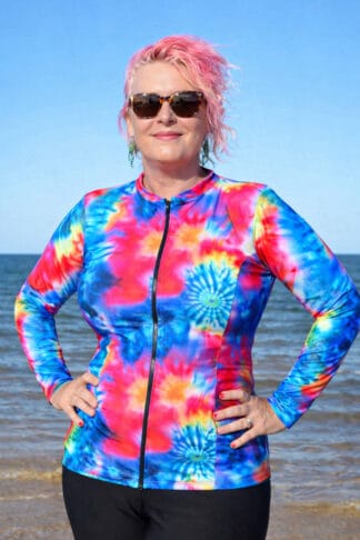 Front view of a women's plus size long sleeve swim shirt in black, featuring an internal shelf bra for bust support and UPF 50+ sun protection.